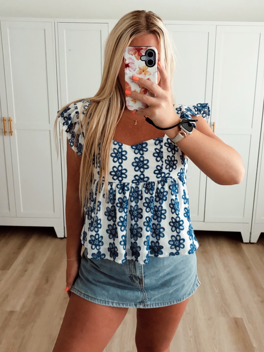 Blue and white embroidered flowy tank top